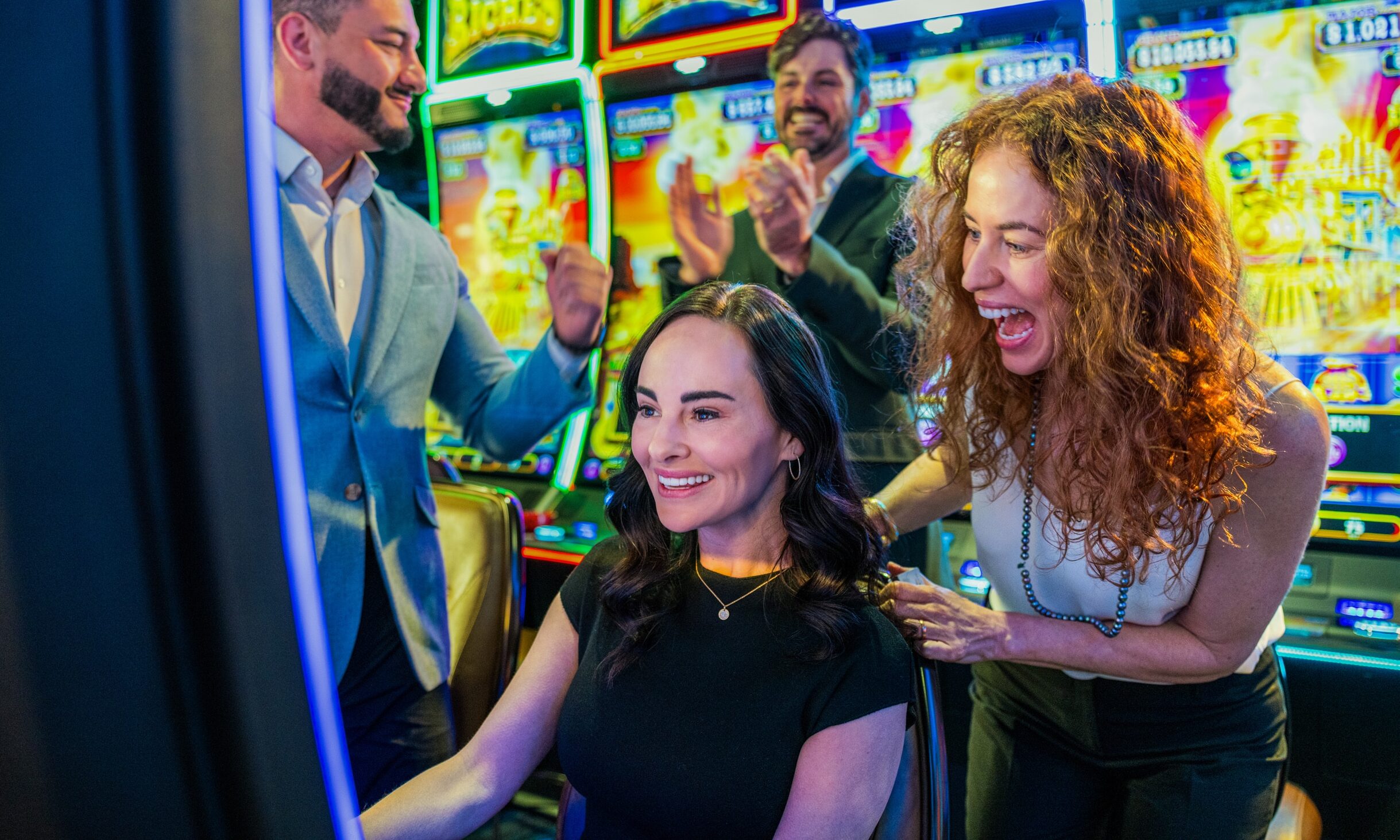 Guests celebrate a win on an electronic slot machine on the Golden Mesa Casino gaming floor.
