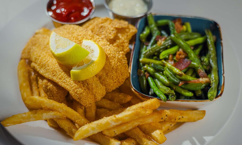 Southern fried catfish with fries and green beans served at Cimarron Ridge Restaurant at Golden Mesa Hotel & Casino.